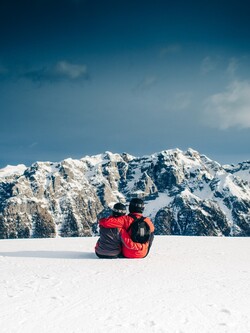 Couple Enjoy Holiday in Snow