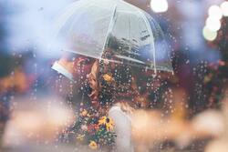 Couple Love in Rain Umbrella