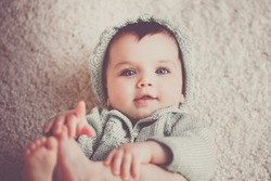 Cute Baby Boy on Home Carpet Photo