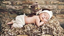 Cute Baby Sleeping With Doll 5K Wallpaper