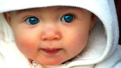 Cute Baby with Blue Eyes Look