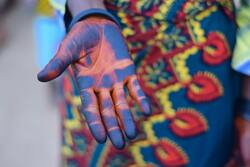 Girl Hand with Blue Color Holi