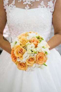 Girl in White Dress With Flowers For Her Wedding