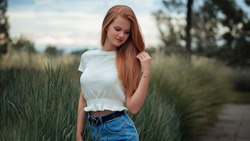 Girl Model Is Wearing Jean Shorts And White Top