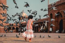 Girl Playing with Birds