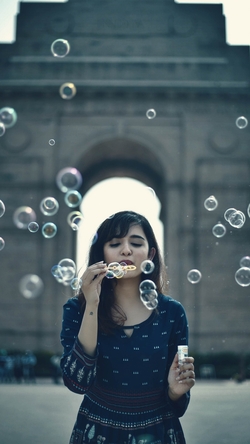 Girl Playing with Bubble