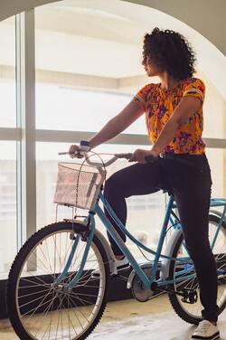 Girl Sitting on Bicycle