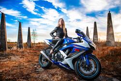 Girl Sitting On Blue And White Suzuki Gsx R