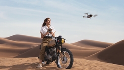 Girl with Bike in Desert
