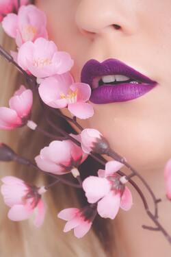 Girl With Purple Lips And Pink Flower
