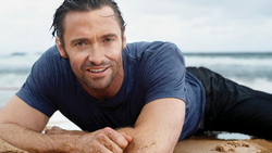 Hugh Jackman Lying On Beach