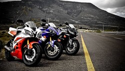 Kawasaki Honda and Yamaha Bikes on Road