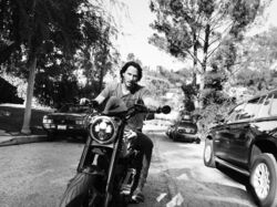 Keanu Reeves Riding Bike