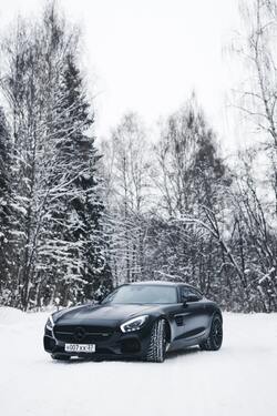 Mercedes Benz Black Car In Snowfall