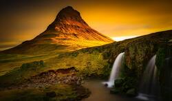 Mountain And Waterfall at The Time of Sunset