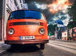 Orange Color Bus on Street