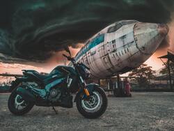 Photo of Bike Near Airplane