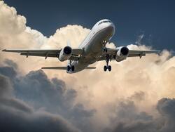 Plane Beside Clouds Low Angle Photography