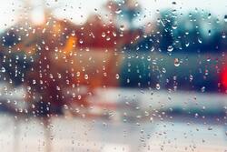 Rain Drops on Glass Window