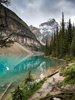 River with Blue Water Between Mountain