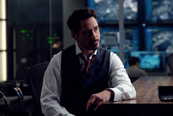 Robert Downey Jr Sitting On Chair 4K Movie Wallpaper