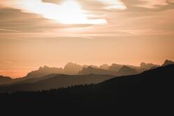 Silhouette of Mountains During Sunset