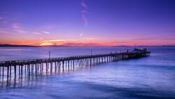 Silhouette Of Pier Sunrise