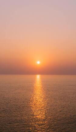 Sunset above Sea and Reflection Pic