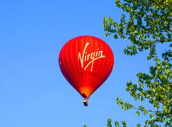 Virgin Red Balloon in Sky