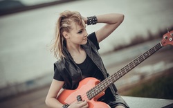 Young Lady With Gitar